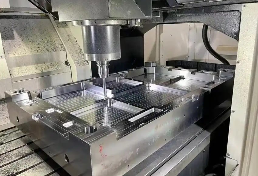 CNC machining of precision molds.