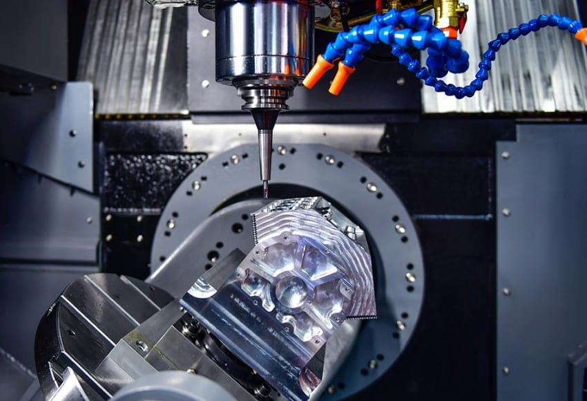 Five-axis CNC machining of automotive engine cylinder blocks.